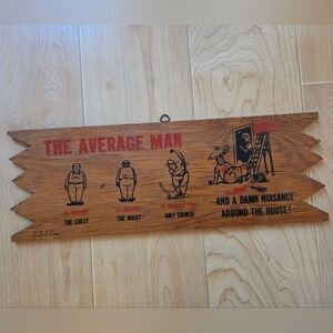 Vintage 1950s (1955) funny wood hanging sign "The Average Man"